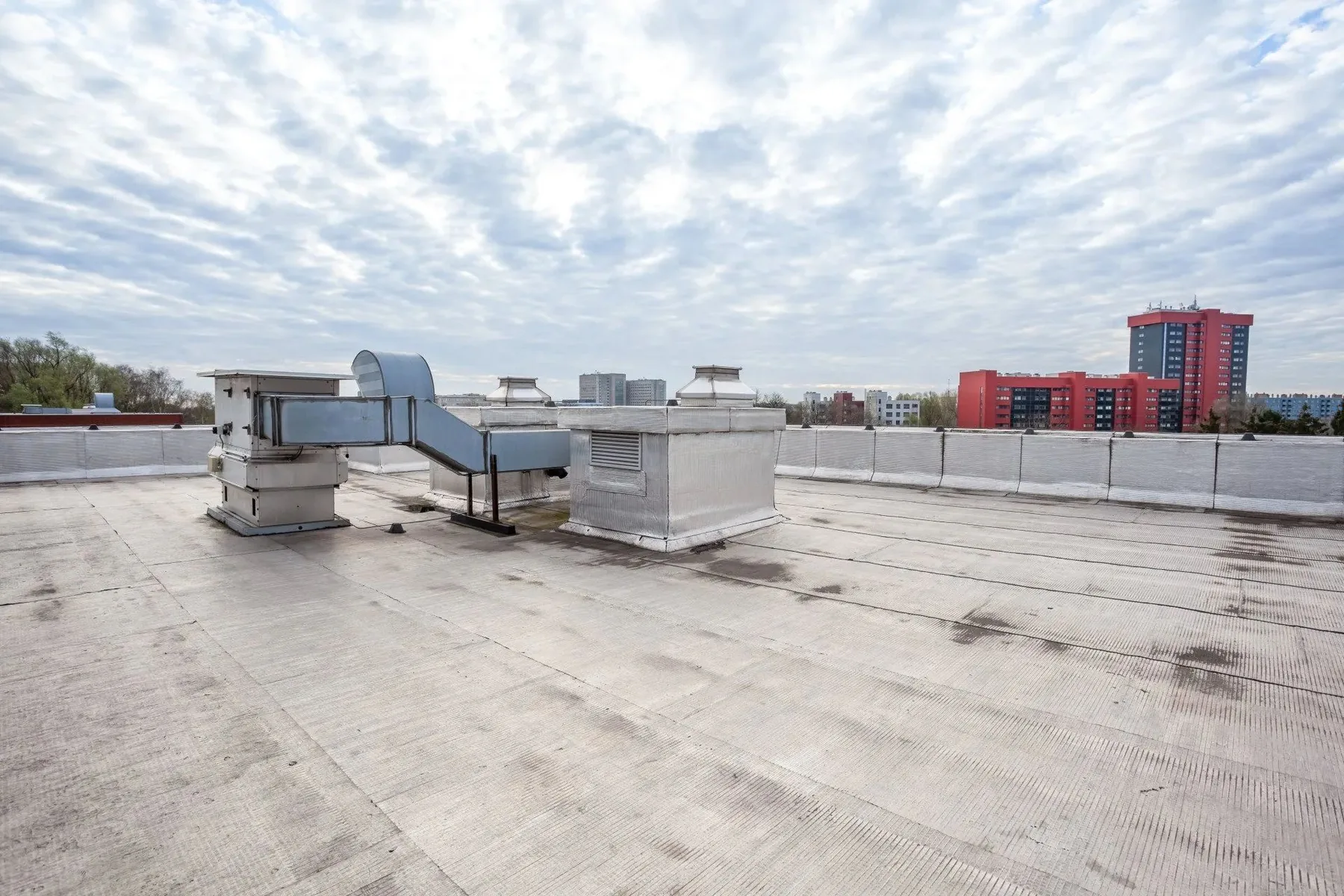 Built-up commercial roofing system installed on a Lexington business